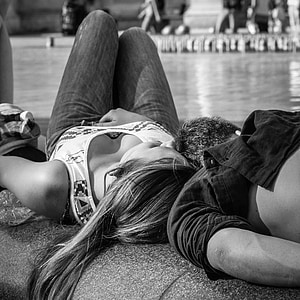 grayscale photo of woman in tank top and pants thumbnail