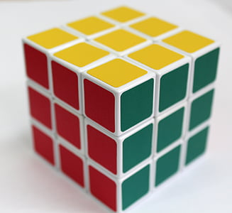 multicolored 3x3 Rubik's Cube on white surface thumbnail