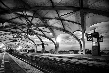 Grayscale Architectural Photography of Empty Train Station thumbnail