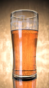 clear pint glass filled with beer thumbnail