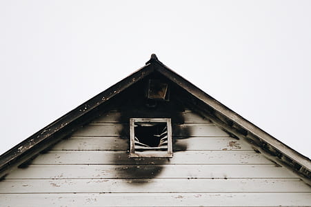 white wooden house under clear sky thumbnail