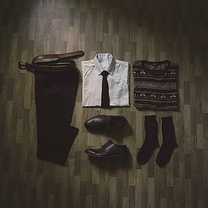 men's assoreted outfit on brown parquet flooring thumbnail