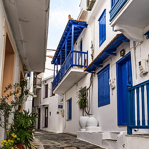 white and blue concrete house thumbnail