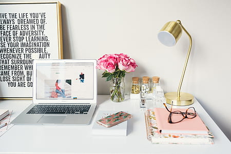 silver MacBook Air on table thumbnail