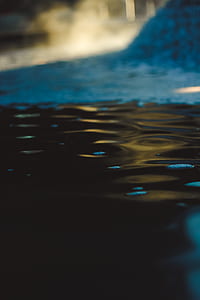 selective focus photography of blue liquid thumbnail