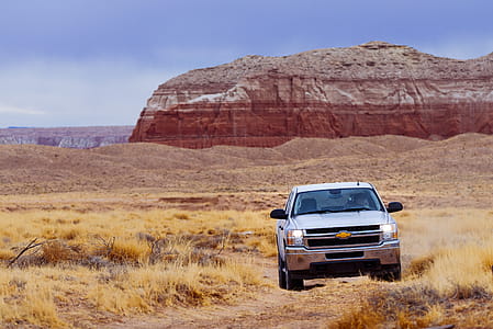 White Chevrolet Vehicle on Dessert thumbnail