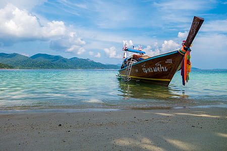 white sailboat during daytime thumbnail