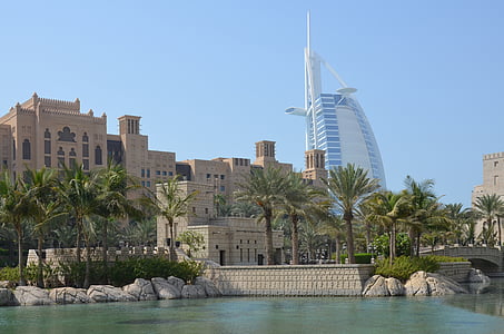 white high-rise building and palm tree thumbnail