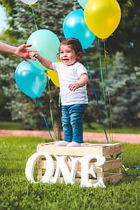 Toddler Standing on Wooden Crate thumbnail