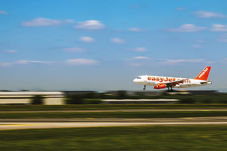 Airplane is landing at the airport in motion thumbnail