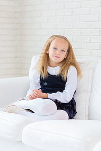 girl sitting on couch thumbnail