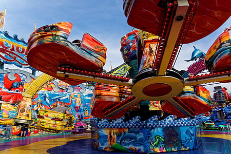 red and yellow park ride at daytime thumbnail