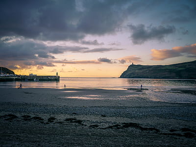 photo of seashore during golden hour thumbnail