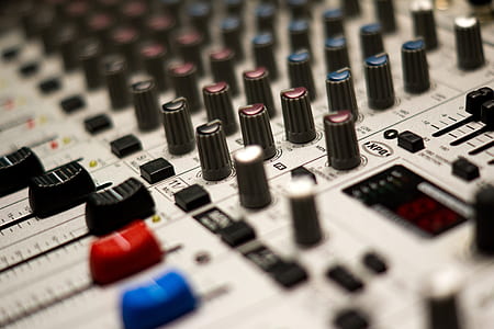 selective focus closeup photography of gray audio mixer thumbnail