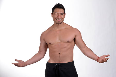 topless man smiling wearing black bottoms thumbnail