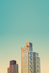 high-rise building under clear green sky thumbnail