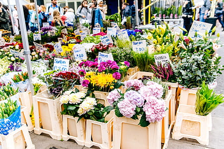 Assorted Flowers With Brown Wooden Rack thumbnail