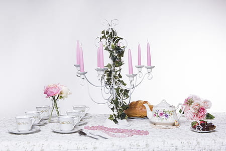 tablet arranged with candelabra and teacups thumbnail
