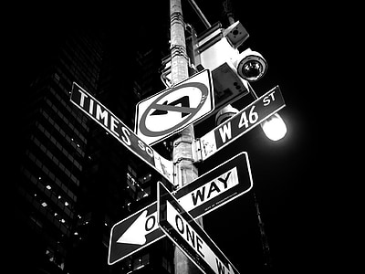 grayscale photo of street signs thumbnail