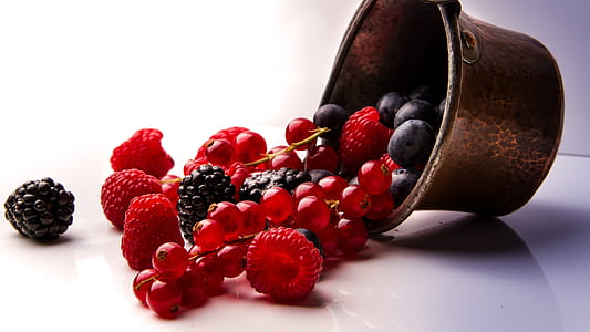 black berries, cherries, and raspberries on white surface thumbnail