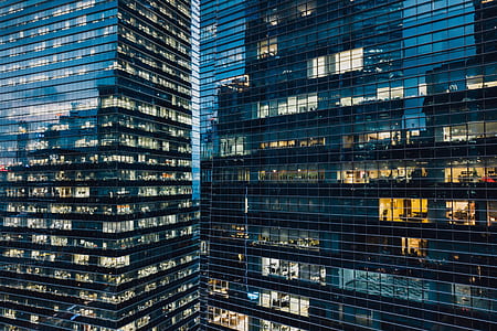 black buildings at night thumbnail