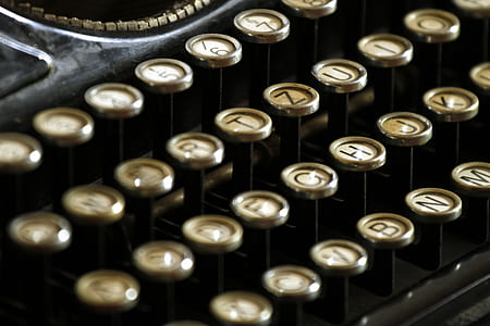 closed-up photography of typing pad thumbnail