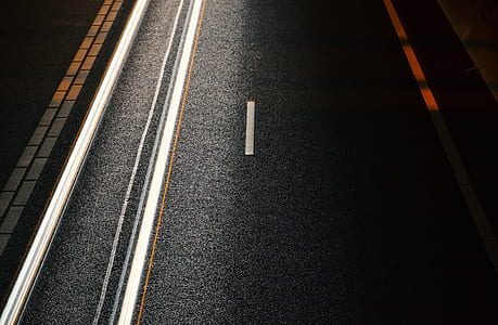 gray road during nightime thumbnail