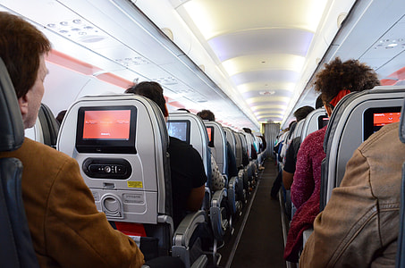 photo of people inside a plane thumbnail
