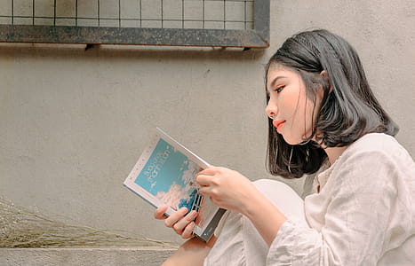 Woman Holding Book thumbnail