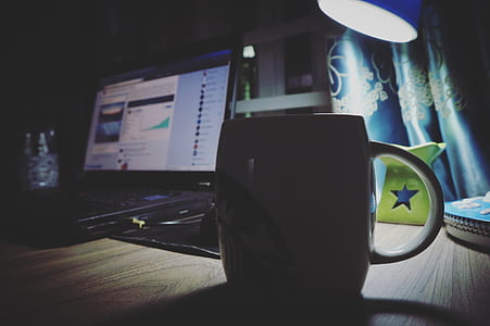 Black Ceramic Mug Near Black Laptop thumbnail