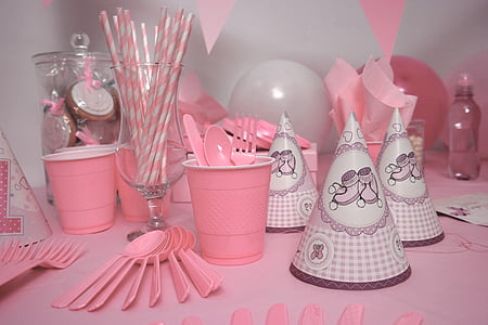 assorted party decor lot on pink surface thumbnail