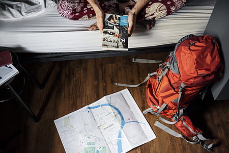 Orange and Gray Hiking Backpack on the Floor thumbnail