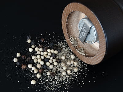 round brown case with white and black beans thumbnail