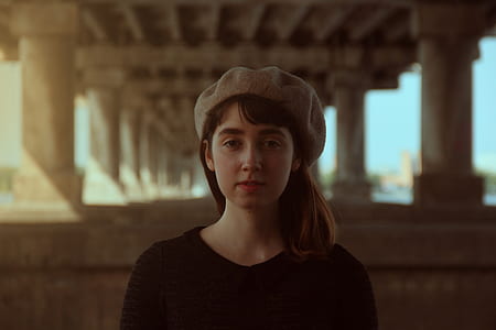 woman in black shirt and gray hat thumbnail