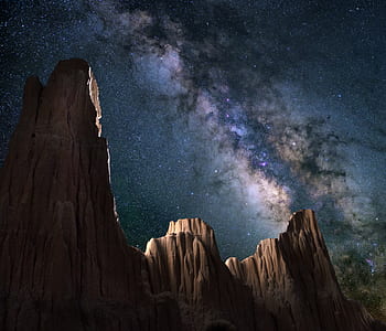 brown rock mountains during nighttime thumbnail