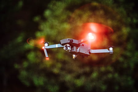 black quadcopter drone selective focus photography thumbnail