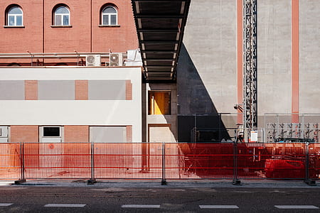 white, brown, and gray concrete high-rise building thumbnail