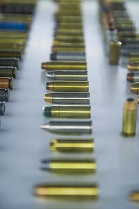assorted-color bullet lot on gray surface thumbnail