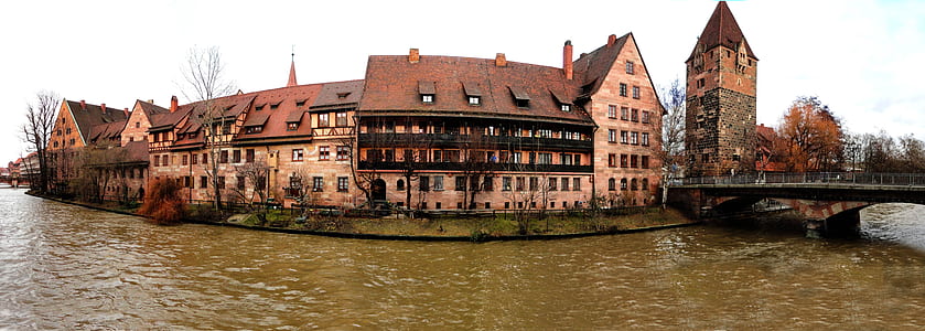 beige and brown castle on body of water thumbnail