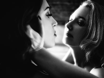 two women facing each other thumbnail