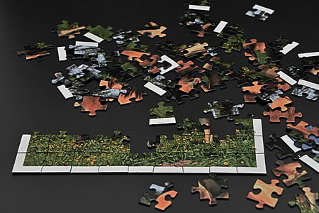 green and white jigsaw puzzle thumbnail