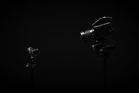 black DSLR camera thumbnail