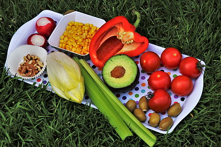 fruits and veggies on serving tray on grass thumbnail