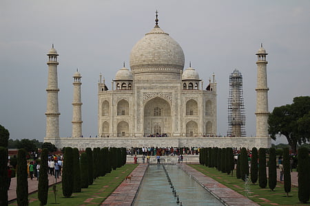 white temple under white clouds thumbnail