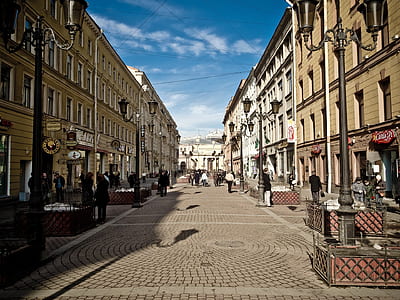 people on sidewalk during day thumbnail