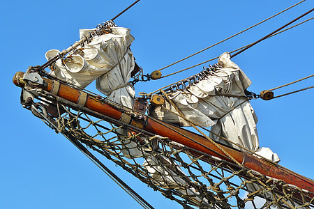 close-up photo of brown and white ship bow at day time thumbnail