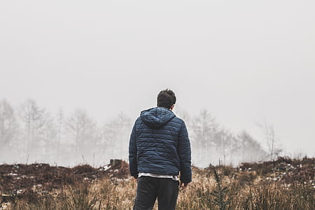 Man Wearing Blue Bubble Hooded Jacket thumbnail
