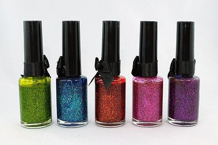 person taking photo of five nail polish bottles thumbnail