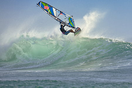 person riding parasail on wave thumbnail