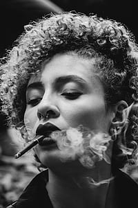 grayscale photo of a smoking woman thumbnail